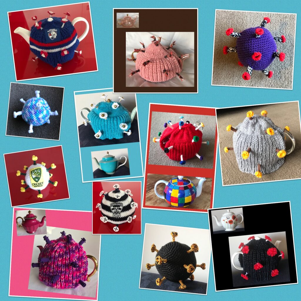 A selected of knitted tea cosies in a COVID virus design