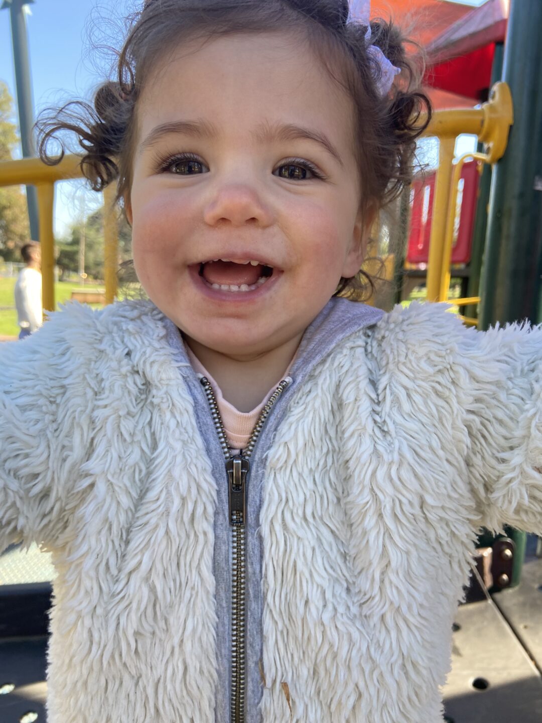 Smiling child at a playground